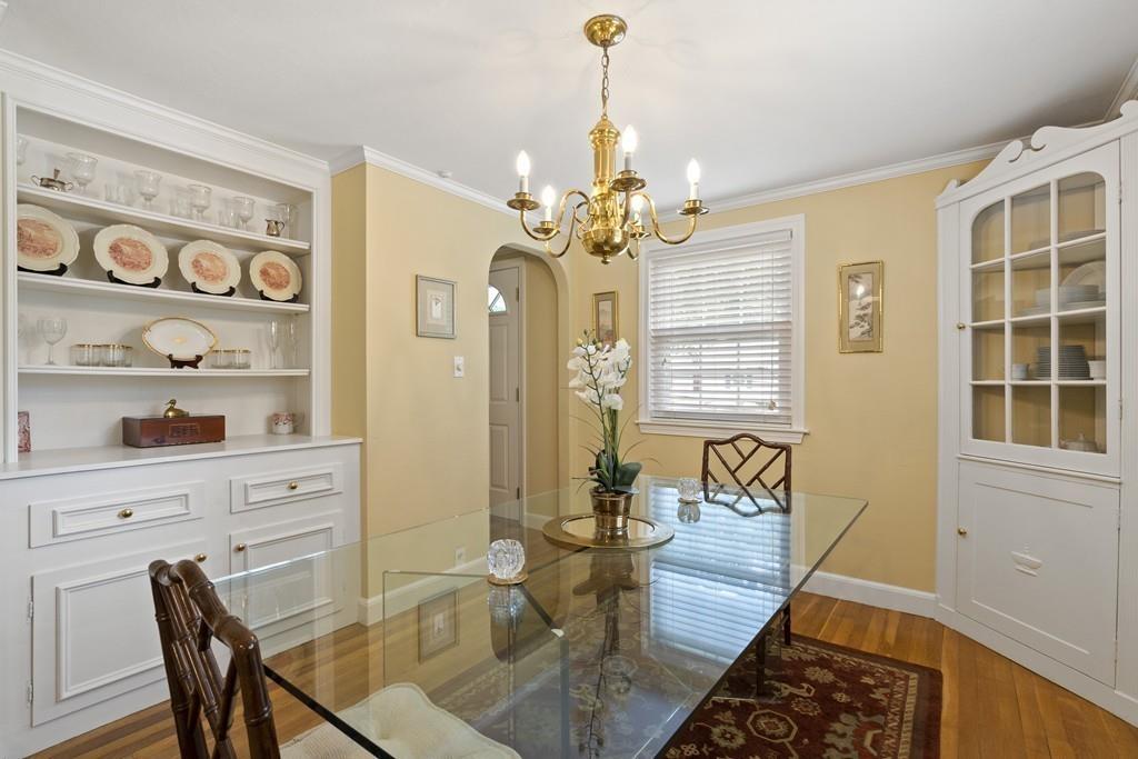56 Ledgewood Road Dedham, MA 02026 - Photo 7 of 36 a view of a dining room with furniture window and wooden floor