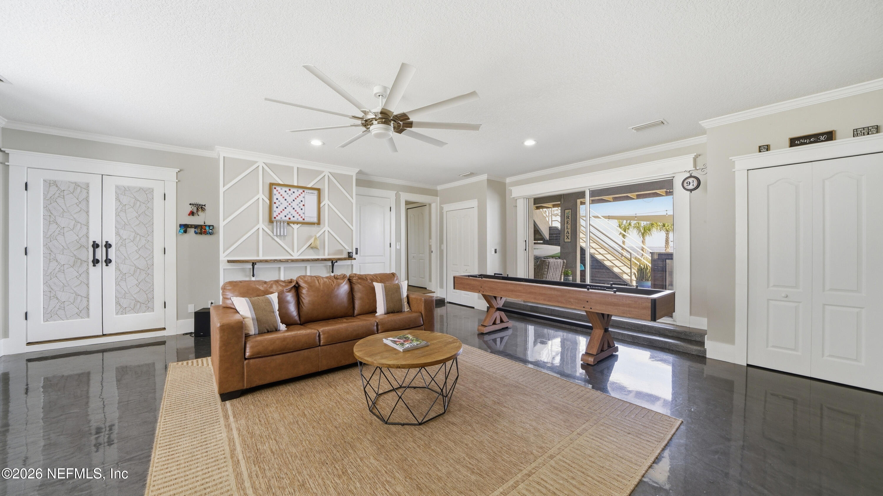 1703 Pelican Place Middleburg, FL 32068 - Photo 18 of 99 a living room with furniture and a large window
