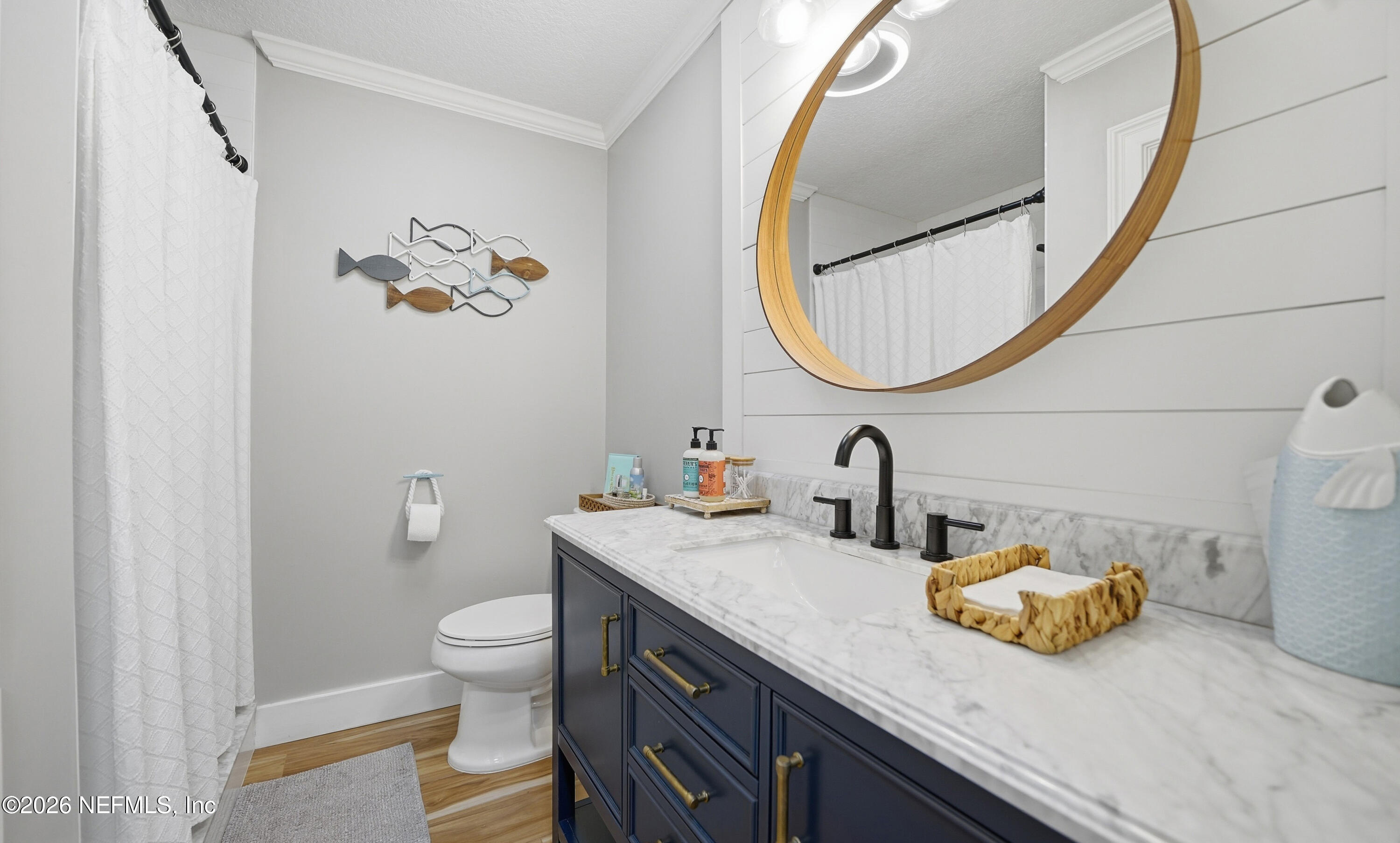 1703 Pelican Place Middleburg, FL 32068 - Photo 25 of 99 a bathroom with a granite countertop sink and a mirror