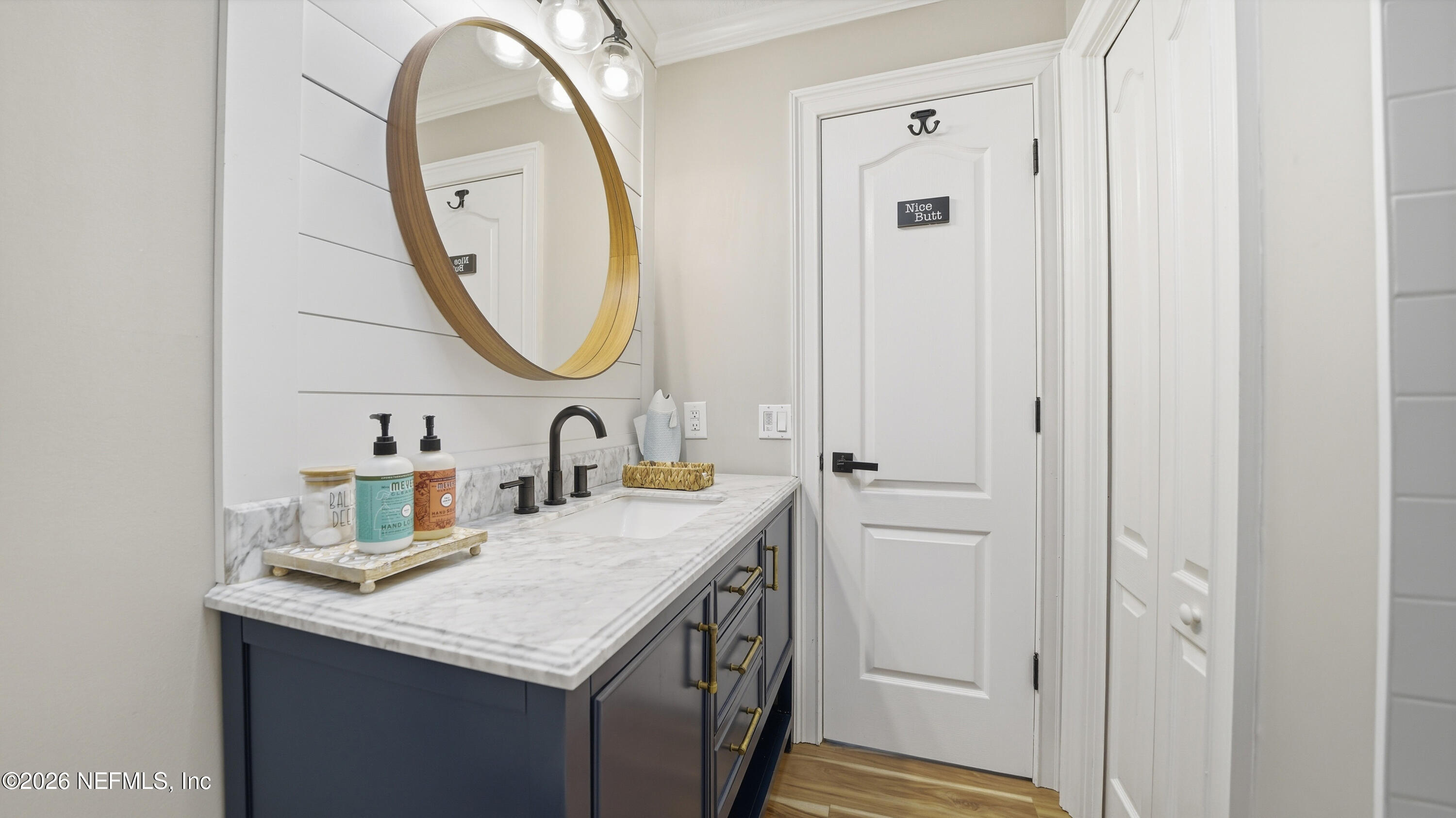 1703 Pelican Place Middleburg, FL 32068 - Photo 27 of 99 a bathroom with a granite countertop sink and a mirror