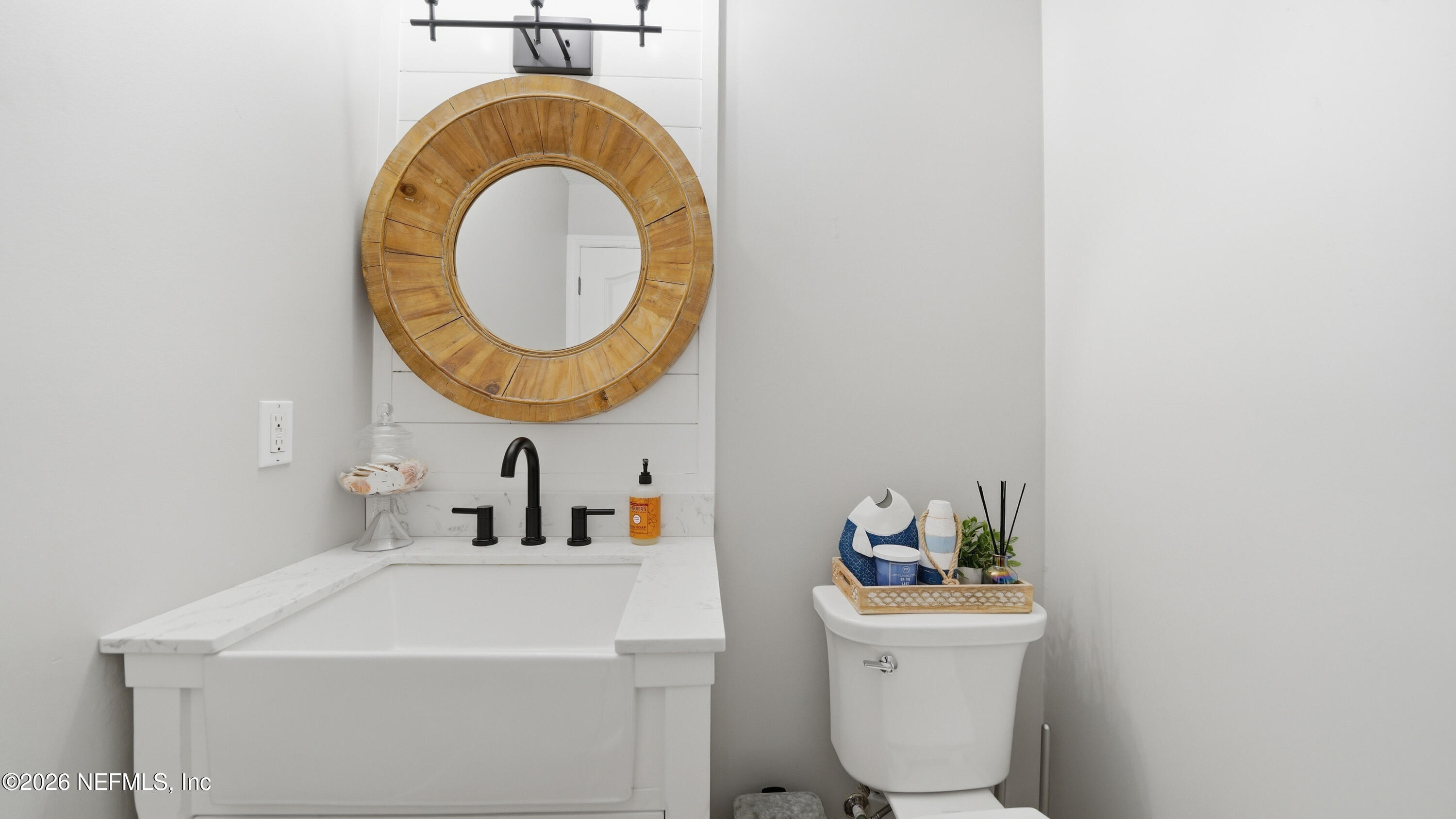 1703 Pelican Place Middleburg, FL 32068 - Photo 47 of 99 a bathroom with a sink mirror toilet and vanity
