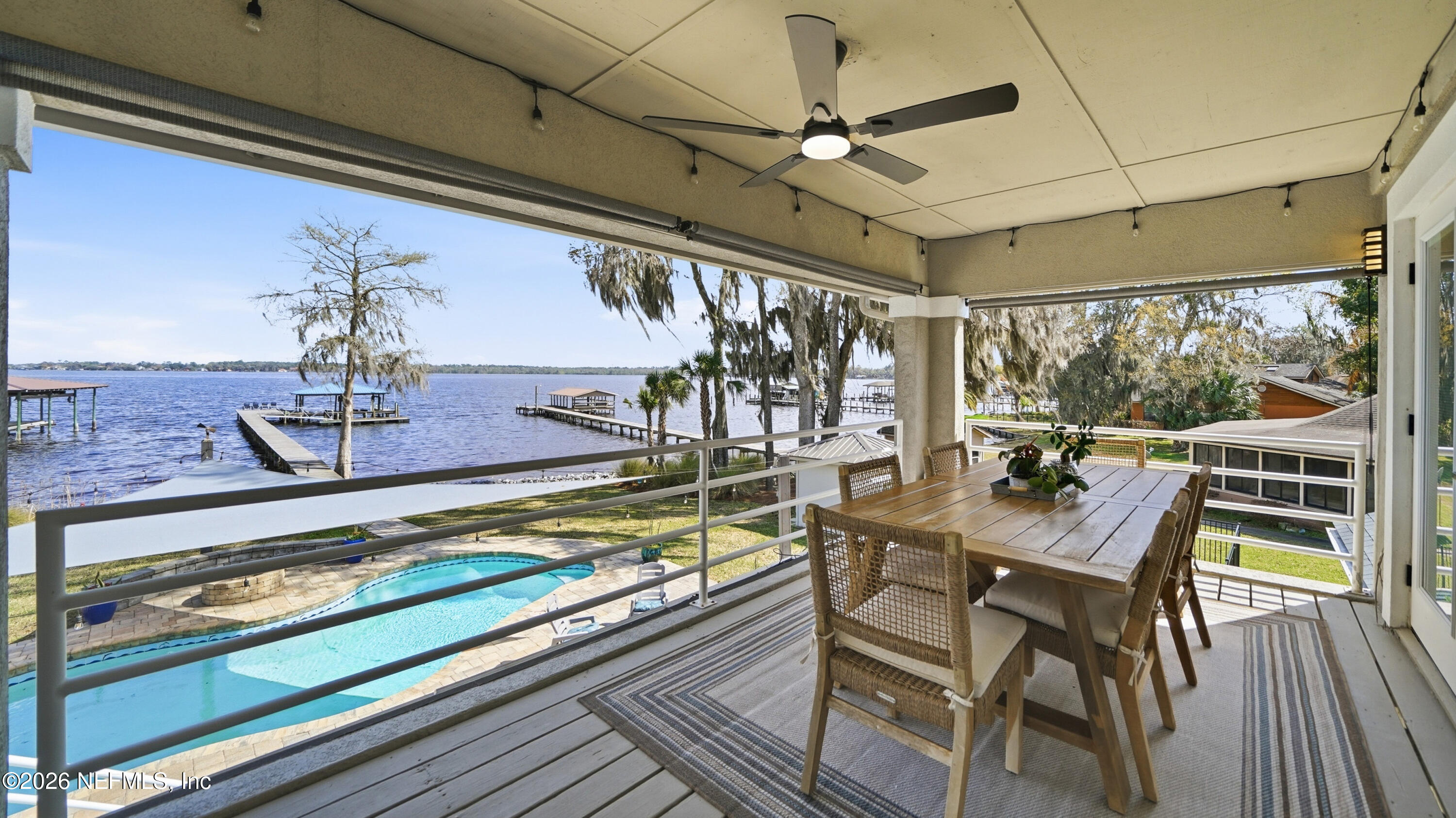 1703 Pelican Place Middleburg, FL 32068 - Photo 56 of 99 a view of a dining room with furniture window and outside view