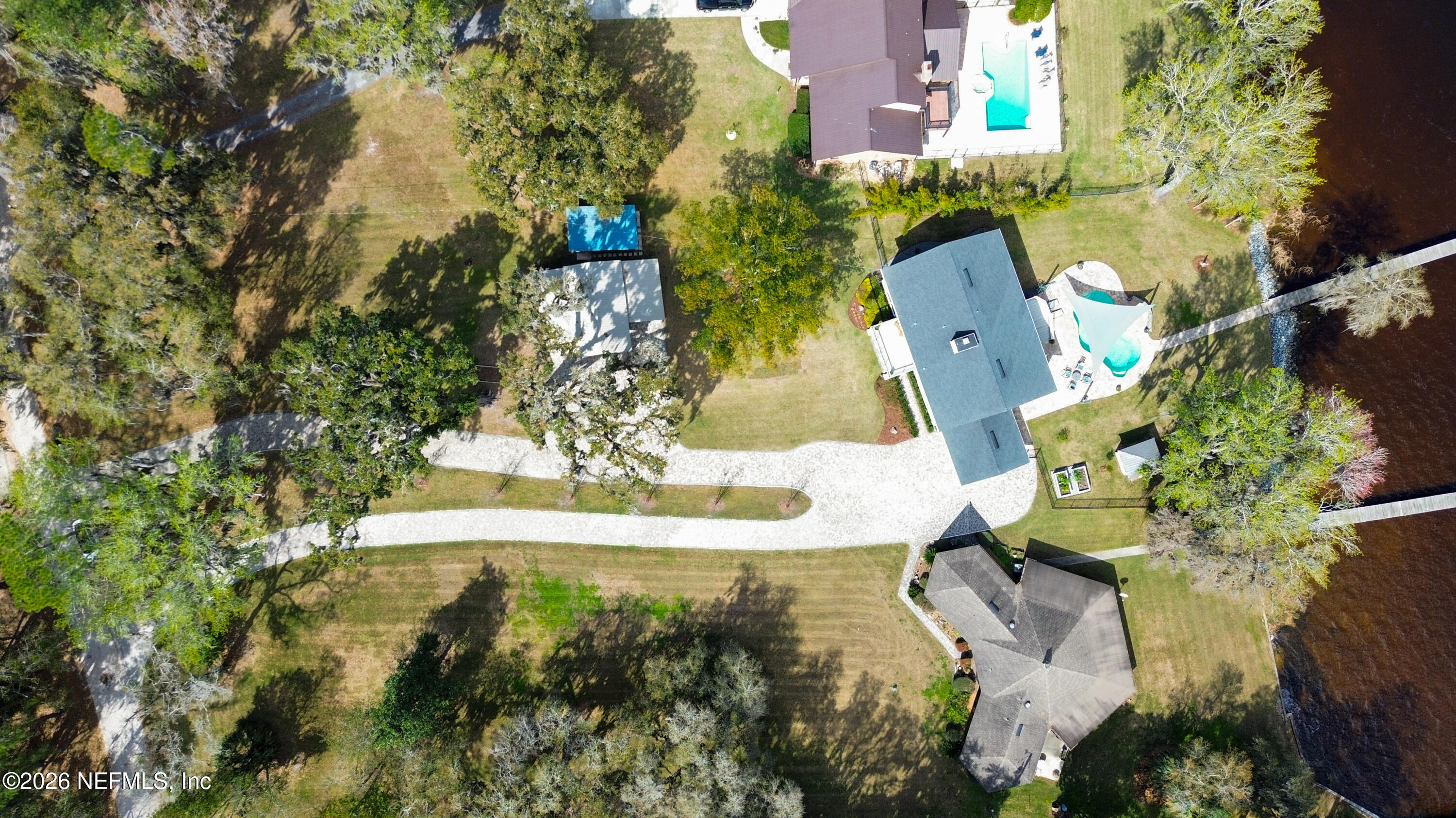 1703 Pelican Place Middleburg, FL 32068 - Photo 83 of 99 an aerial view of residential house with outdoor space and swimming pool