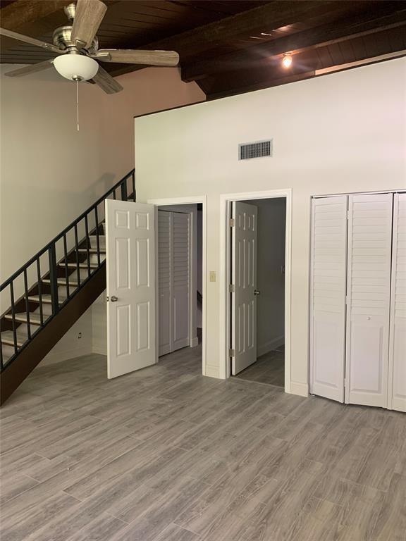4761 Northwest 2nd Avenue, Unit 307 Boca Raton, FL 33431 - Photo 11 of 15 a view of a hallway with wooden floor