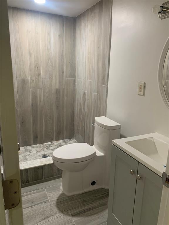 4761 Northwest 2nd Avenue, Unit 307 Boca Raton, FL 33431 - Photo 2 of 15 a bathroom with a sink and a toilet