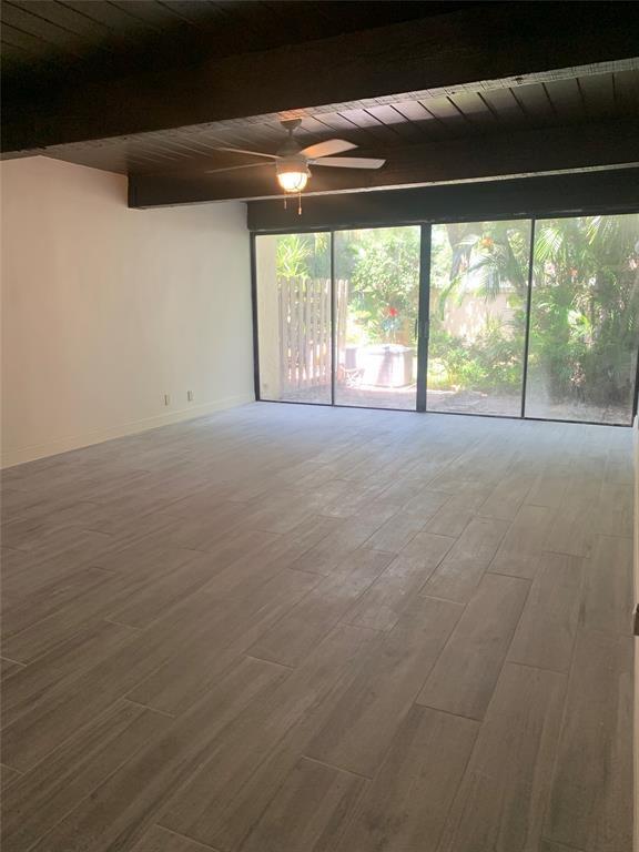 4761 Northwest 2nd Avenue, Unit 307 Boca Raton, FL 33431 - Photo 4 of 15 a view of a room with a large window