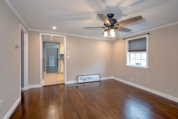 7 Weyham Road Weymouth, MA 02191 - Photo 19 of 38 a view of a livingroom with a ceiling fan and wooden floor