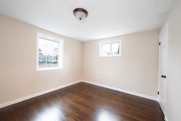 7 Weyham Road Weymouth, MA 02191 - Photo 20 of 38 a view of a room that has wooden floor and windows