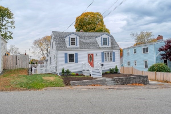 7 Weyham Road Weymouth, MA 02191 - Photo 2 of 38 a front view of a house with a yard