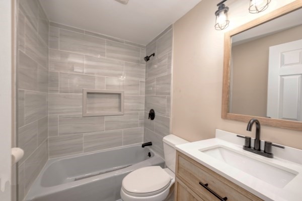 7 Weyham Road Weymouth, MA 02191 - Photo 24 of 38 a bathroom with a sink a toilet and shower