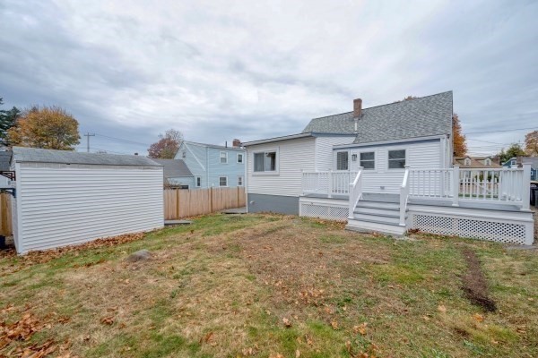 7 Weyham Road Weymouth, MA 02191 - Photo 9 of 38 a view of a house with a yard and garage
