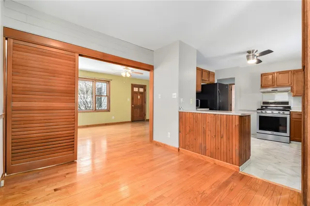 a view of a kitchen with a sink and a kitchen