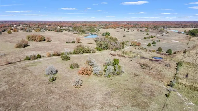 an aerial view of mountain with beach