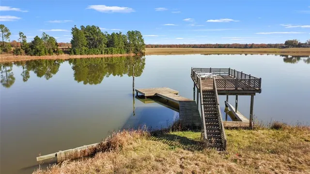 a view of a lake with a outdoor space