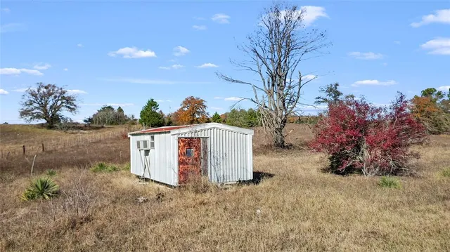 an aerial view of beach with city view