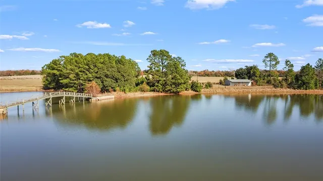 a view of a lake with a city