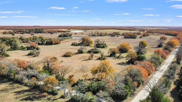 an aerial view of beach and city