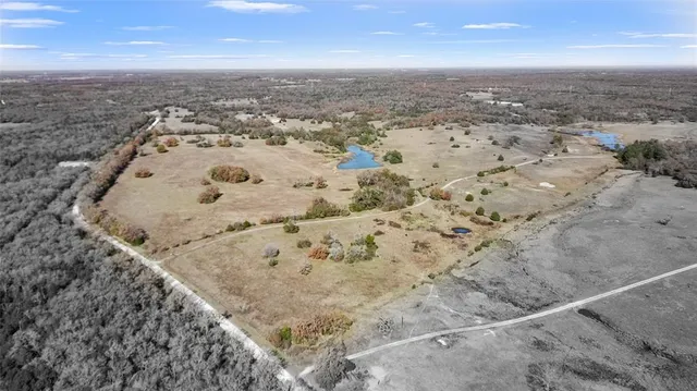 an aerial view of beach and ocean