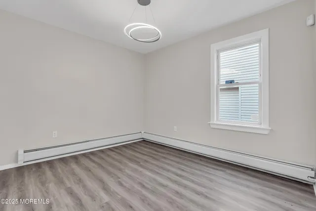 a kitchen with stainless steel appliances granite countertop a refrigerator sink and cabinets