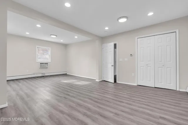 a bathroom with a sink toilet and a mirror