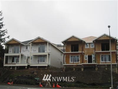 3717 Rucker Avenue Everett, WA 98201 - Photo 1 of 1 a front view of a house with a yard