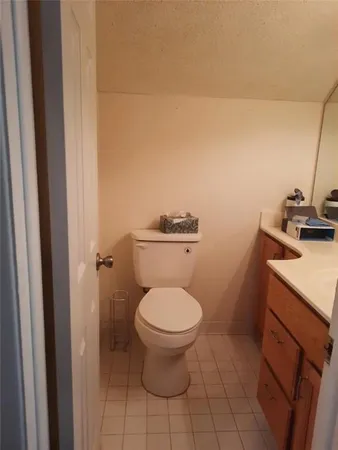a view of a small space with wooden floor