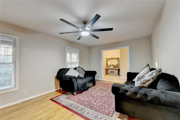 a living room with furniture and rug