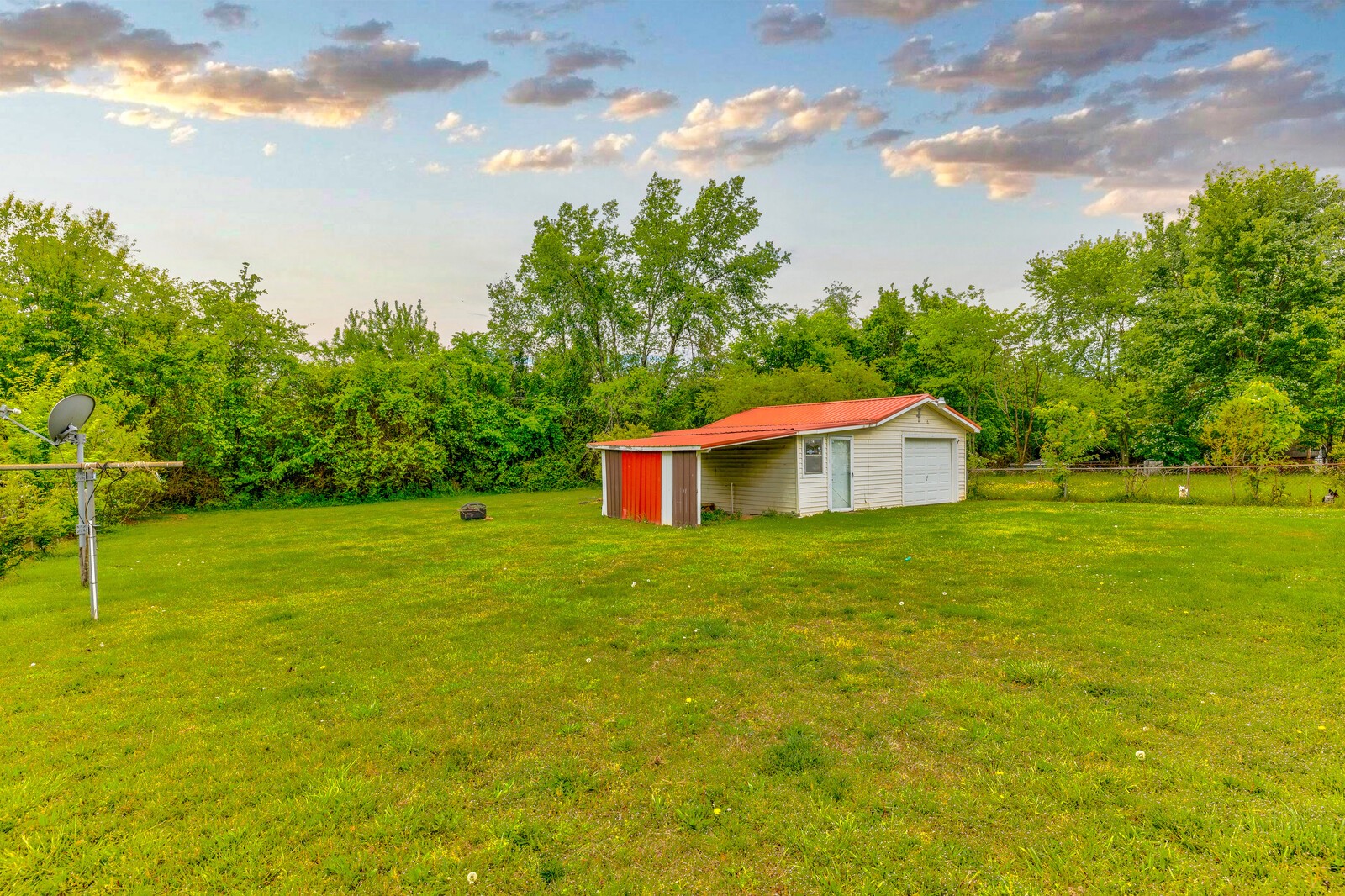 1721 Midland Road Shelbyville, TN 37160 - Photo 24 of 29 a view of a big yard with swimming pool and green space