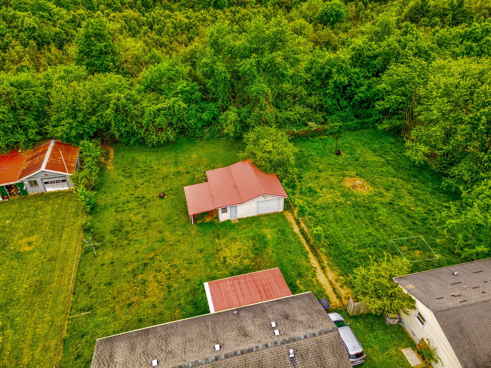 1721 Midland Road Shelbyville, TN 37160 - Photo 25 of 29 an aerial view of a house with a yard