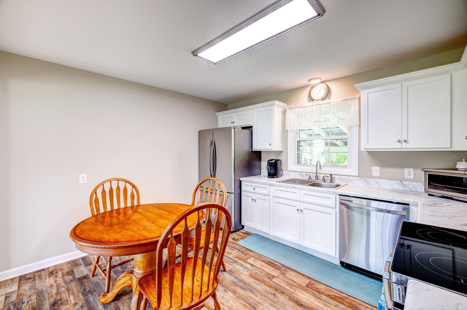 1721 Midland Road Shelbyville, TN 37160 - Photo 7 of 29 a kitchen with a sink appliances and cabinets