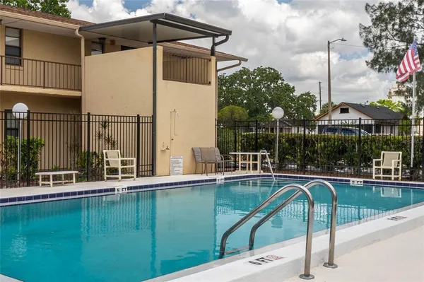 a view of a house with a swimming pool