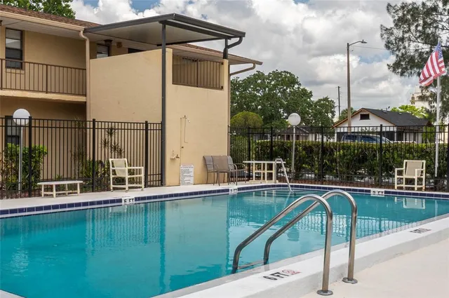 a view of a house with a swimming pool