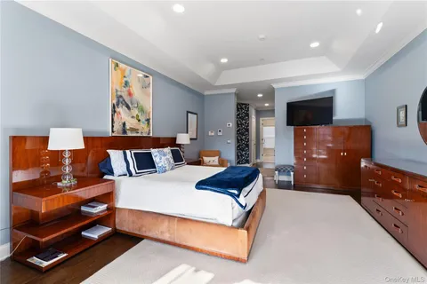 a bedroom with bed and window