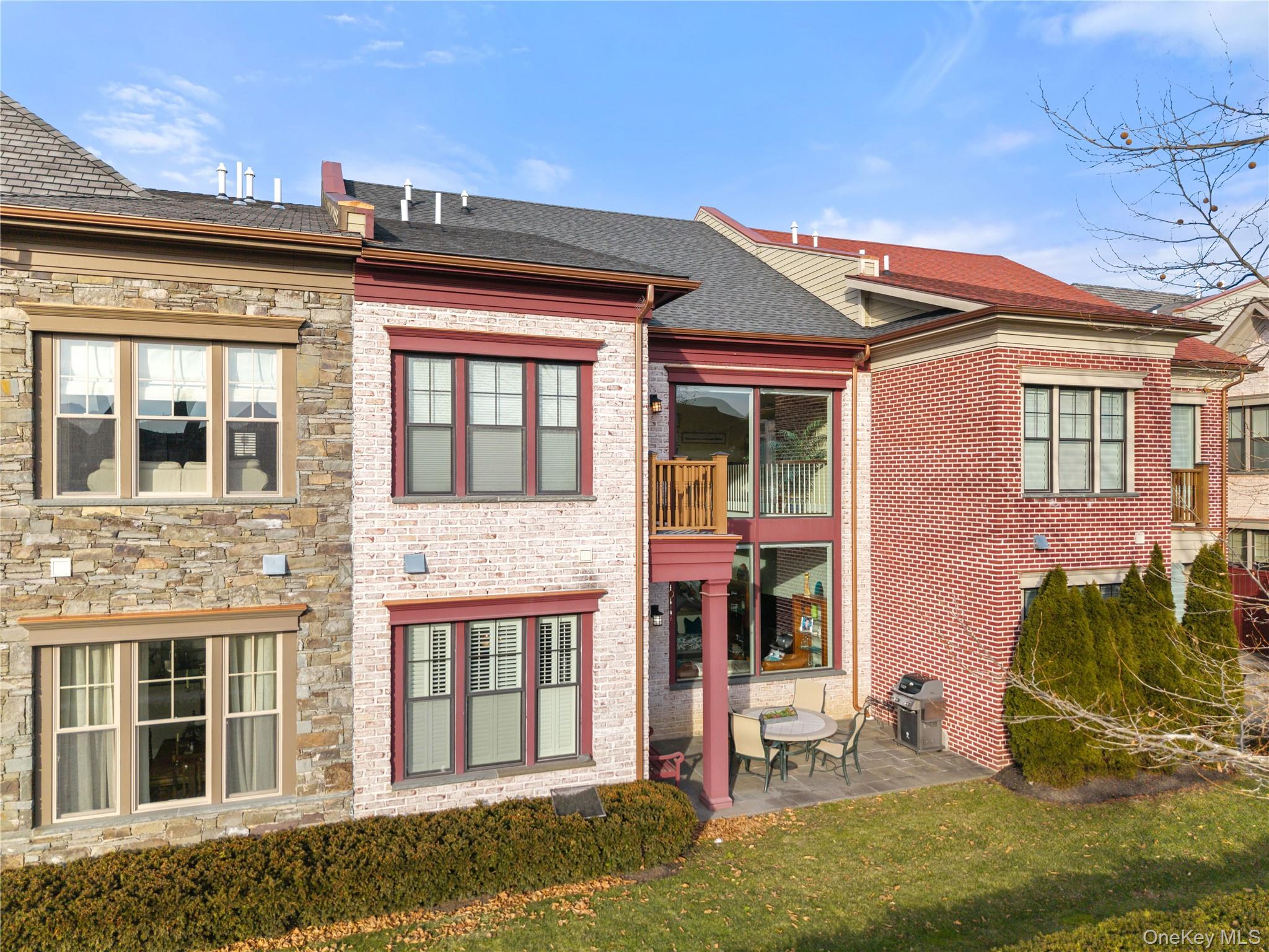 6 Hudson View Way Tarrytown, NY 10591 - Photo 44 of 50 front view of a brick house with a yard