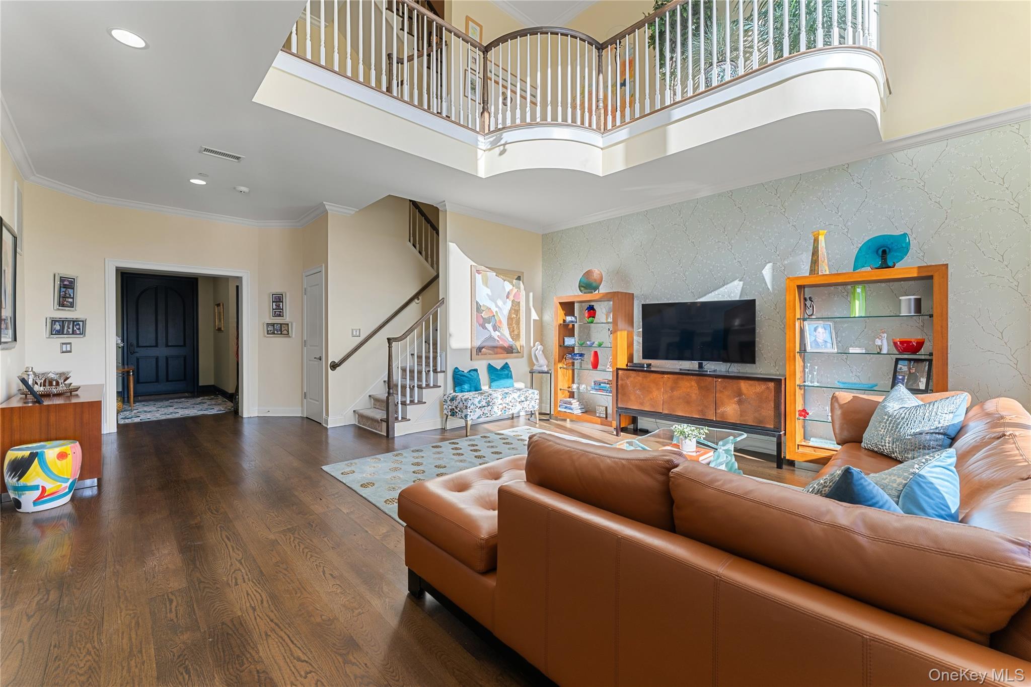 6 Hudson View Way Tarrytown, NY 10591 - Photo 7 of 50 a living room with furniture and a flat screen tv