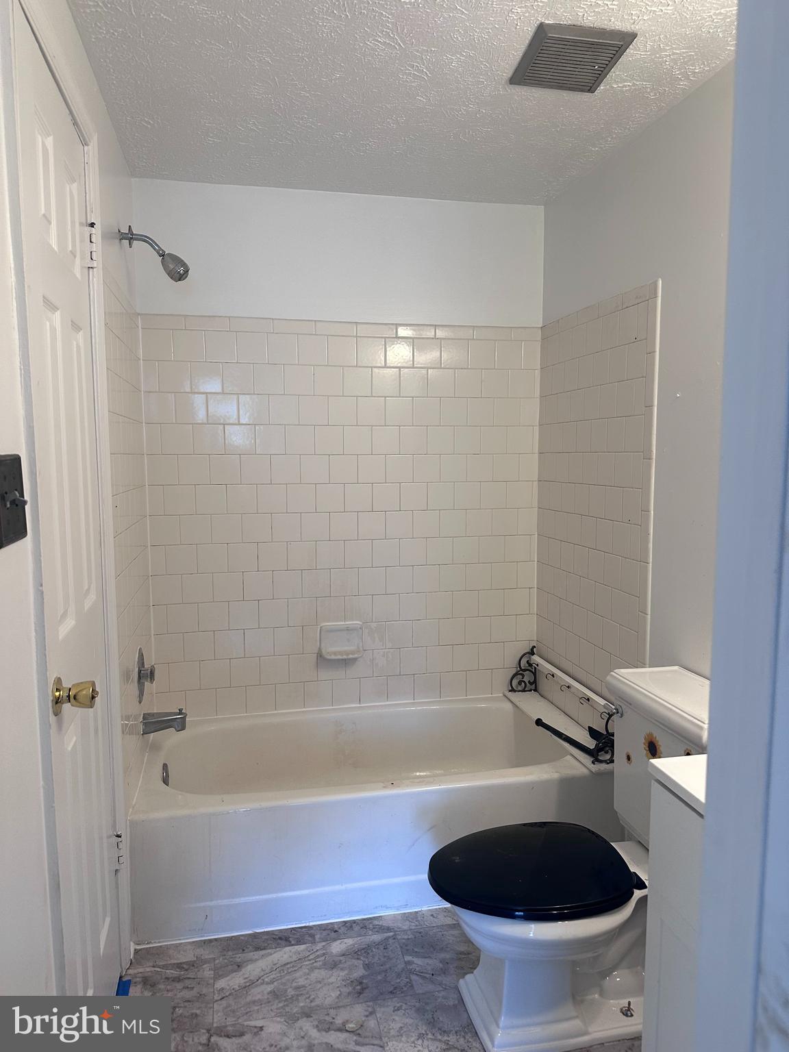 1488 Dockside Court Frederick, MD 21701 - Photo 11 of 16 a bathroom with a sink a toilet and shower