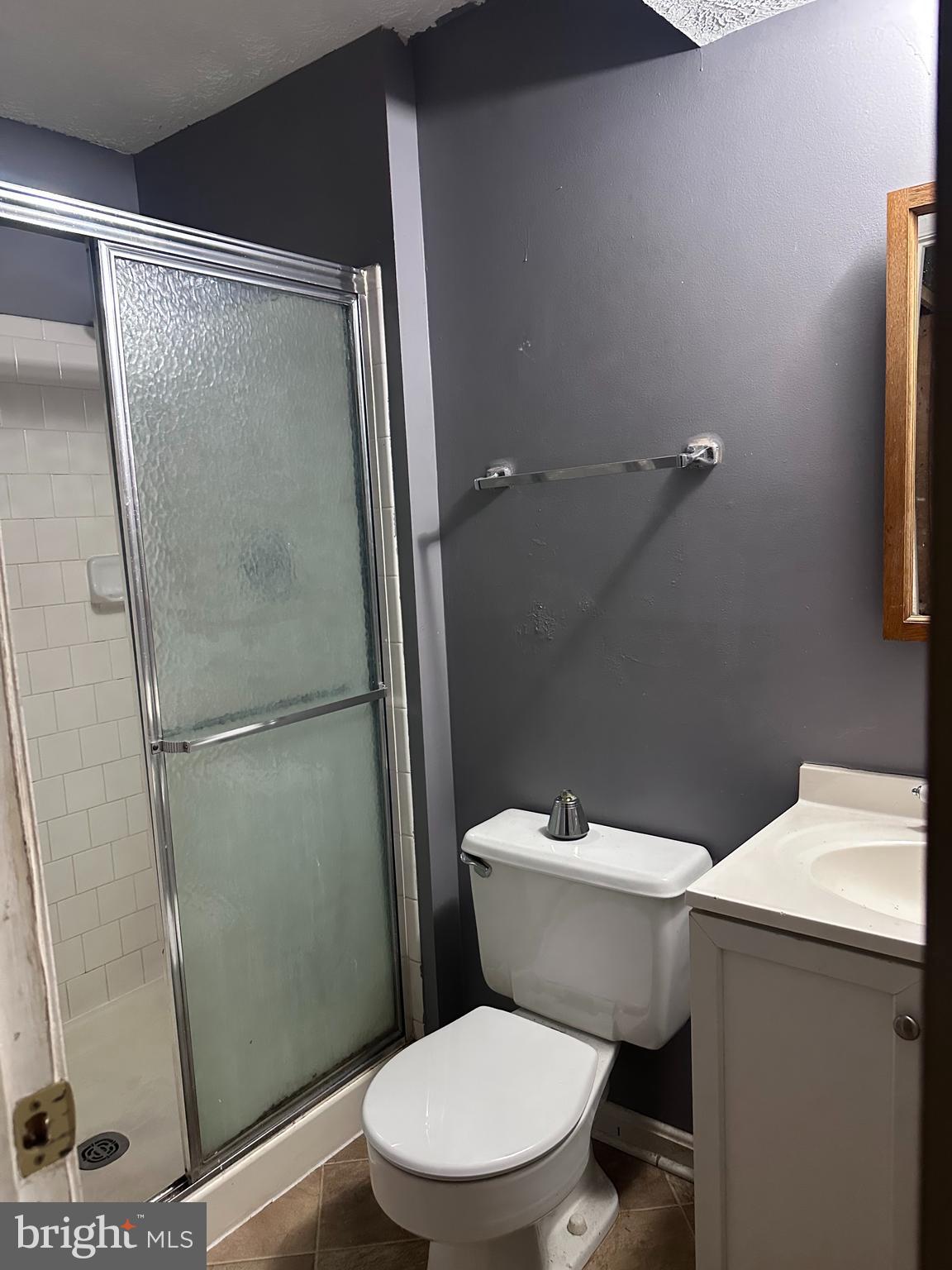 1488 Dockside Court Frederick, MD 21701 - Photo 14 of 16 a white toilet sitting next to a shower