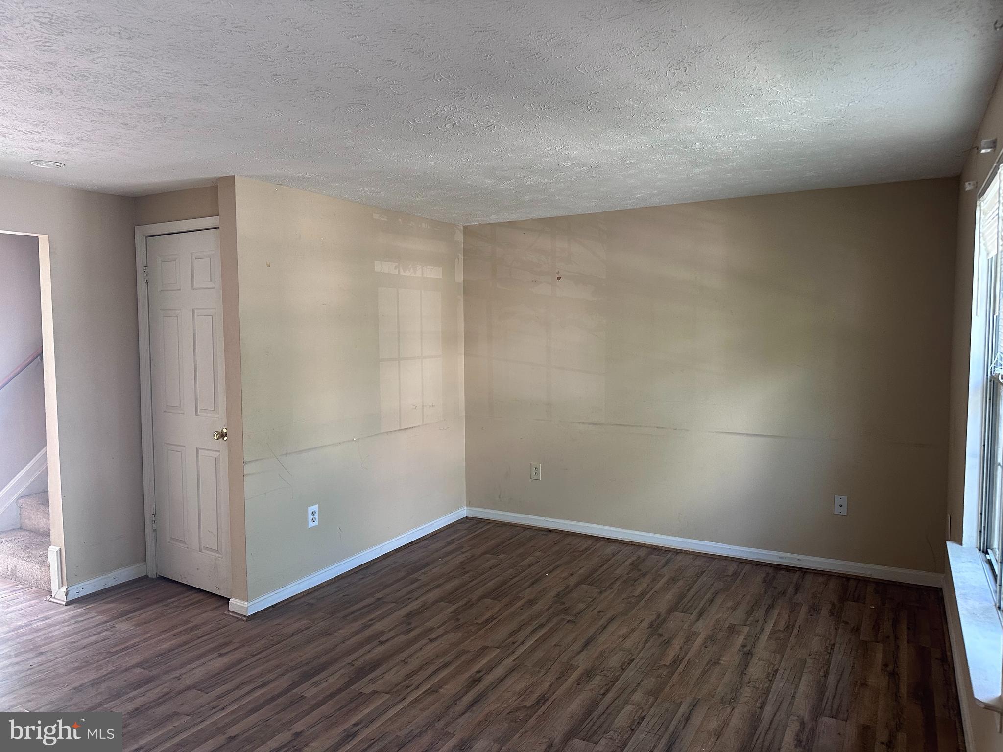 1488 Dockside Court Frederick, MD 21701 - Photo 2 of 16 a view of an empty room with wooden floor