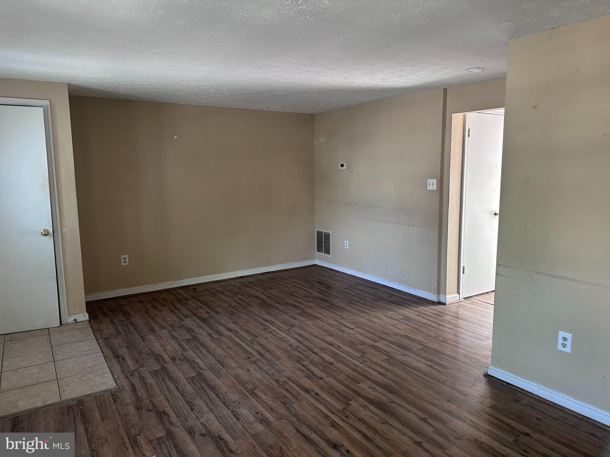 1488 Dockside Court Frederick, MD 21701 - Photo 3 of 16 wooden floor in an empty room