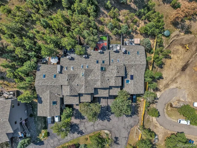 an aerial view of residential house with outdoor space