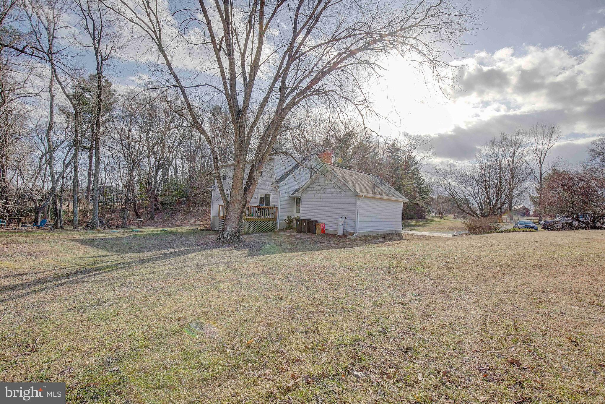 9150 Mackall Road St. Leonard, MD 20685 - Photo 38 of 48 a house with trees in front of it