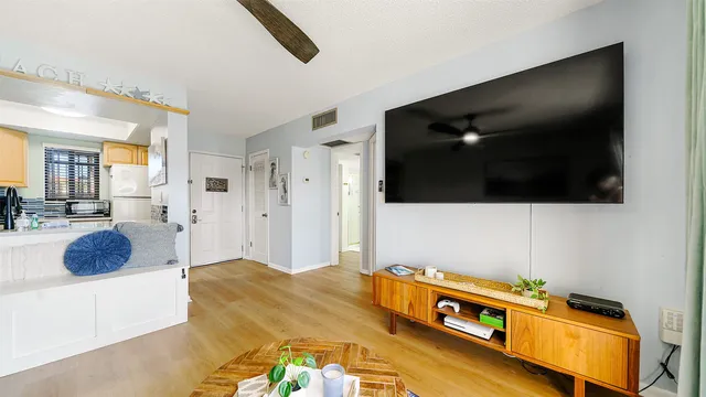 a living room with a flat screen tv