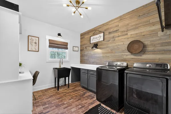 a kitchen with a stove and a refrigerator