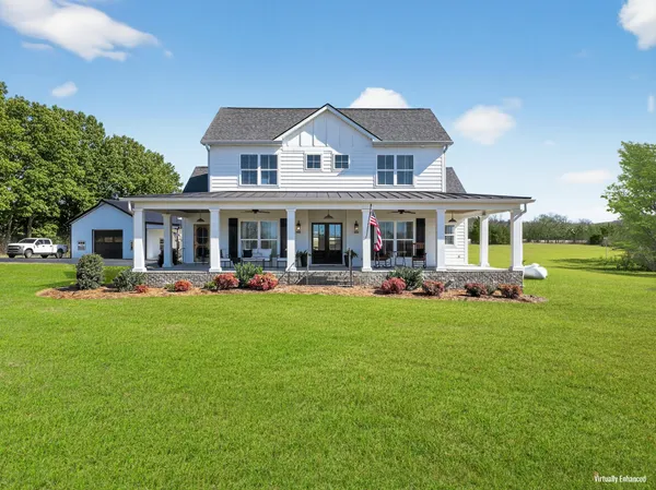 a view of a yard in front of house