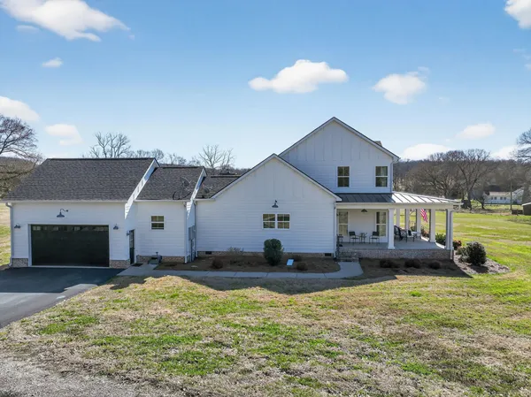 a house view with a garden space