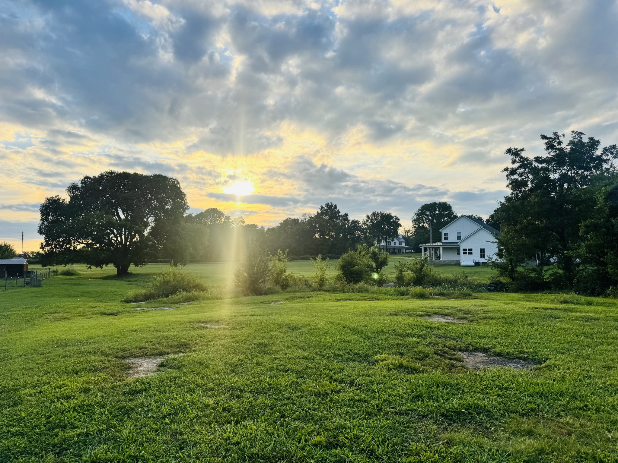 10640 Jordan Road Lascassas, TN 37085 - Photo 37 of 45 a view of a big yard with a house in the background