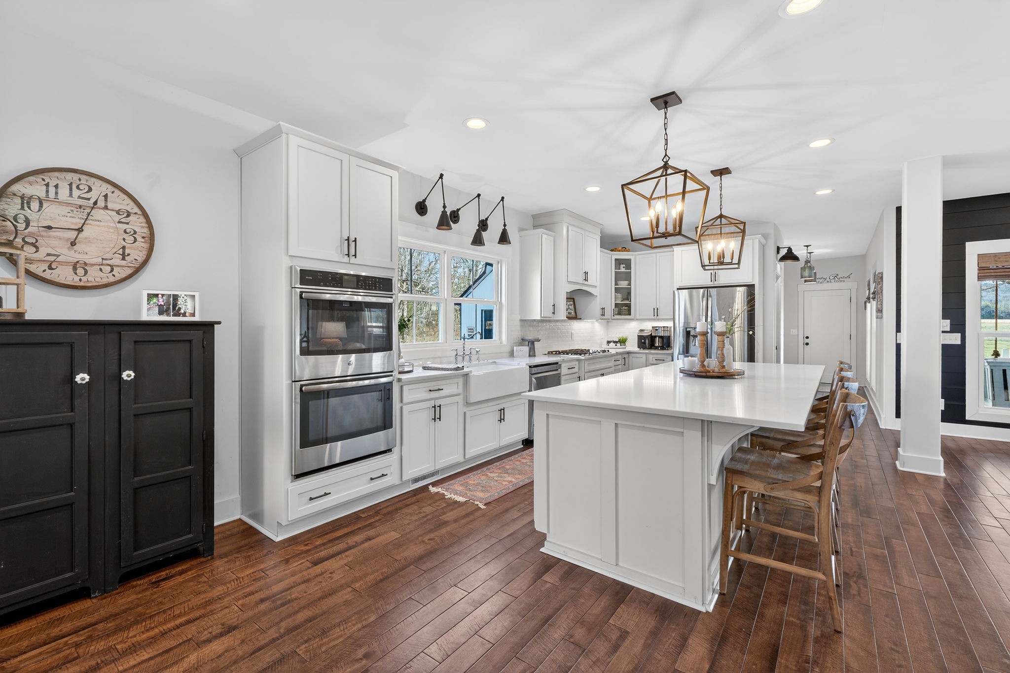 10640 Jordan Road Lascassas, TN 37085 - Photo 7 of 45 a kitchen with stainless steel appliances a stove top oven a sink and cabinets