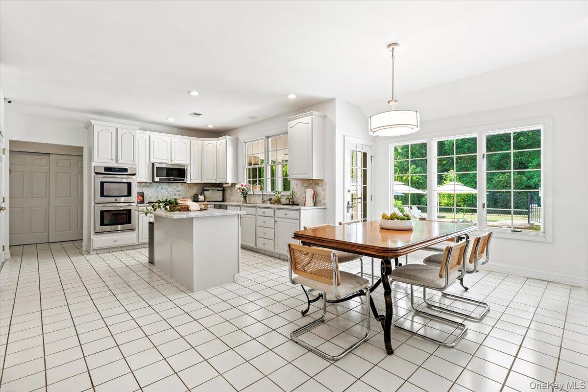 32 Rolling Ridge Road White Plains, NY 10605 - Photo 10 of 32 Gourmet, eat in kitchen with easy access to the backyard and pool.