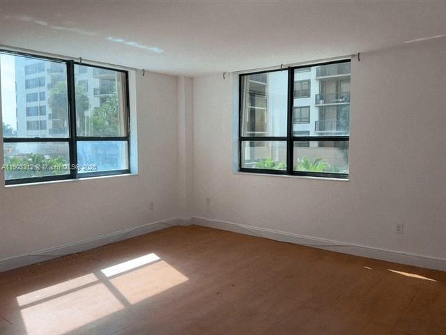10185 Collins Avenue, Unit 308 Bal Harbour, FL 33154 - Photo 2 of 25 an empty room with a window