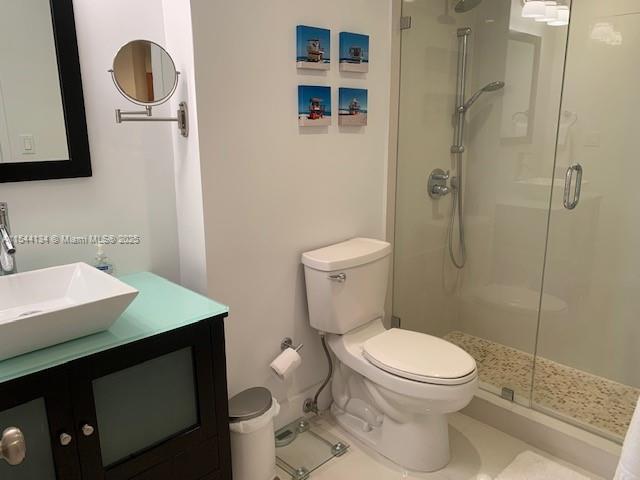 100 Lincoln Road, Unit 819 Miami Beach, FL 33139 - Photo 10 of 33 a bathroom with a toilet a sink and shower